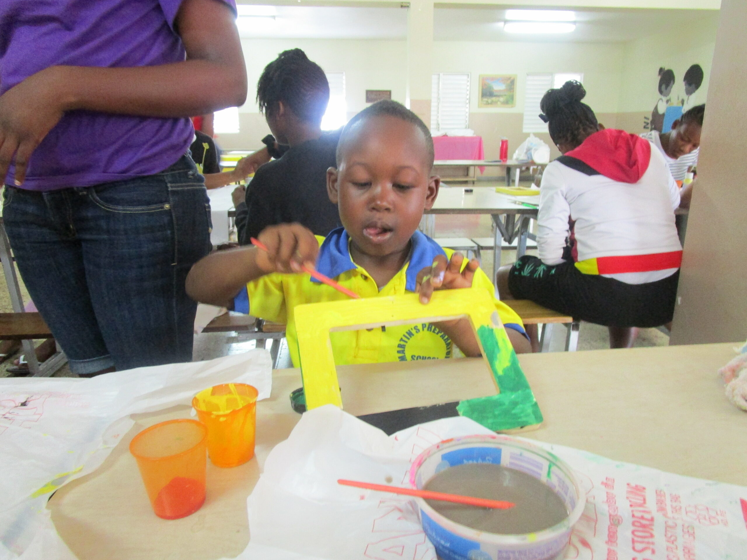 Doing Artwork with Students at CCCD, Jamaica