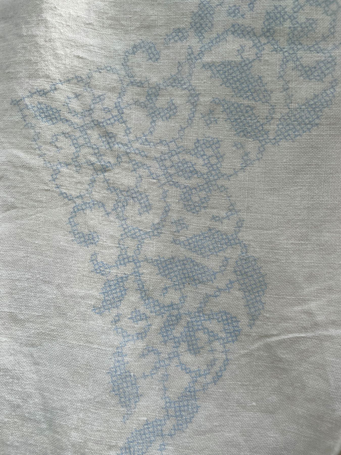 cross stitched table cloth